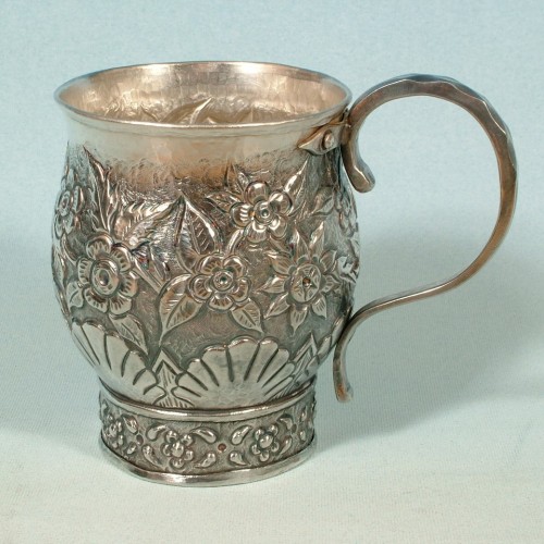 Silver-plated patinated mug