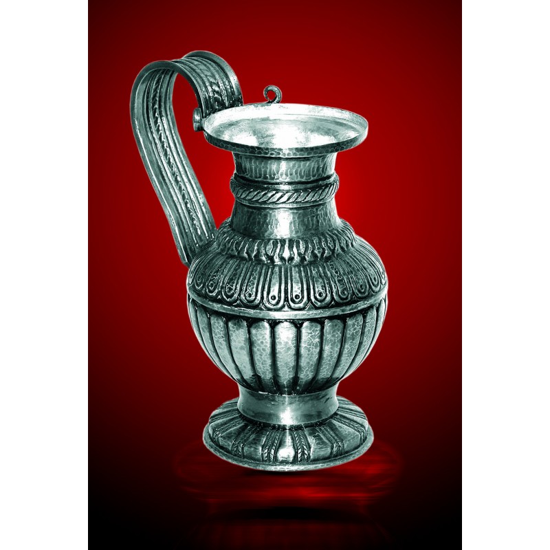 A silver-plated copper pot replica of a rogozene treasure