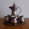 Copper wine service with a set of cups